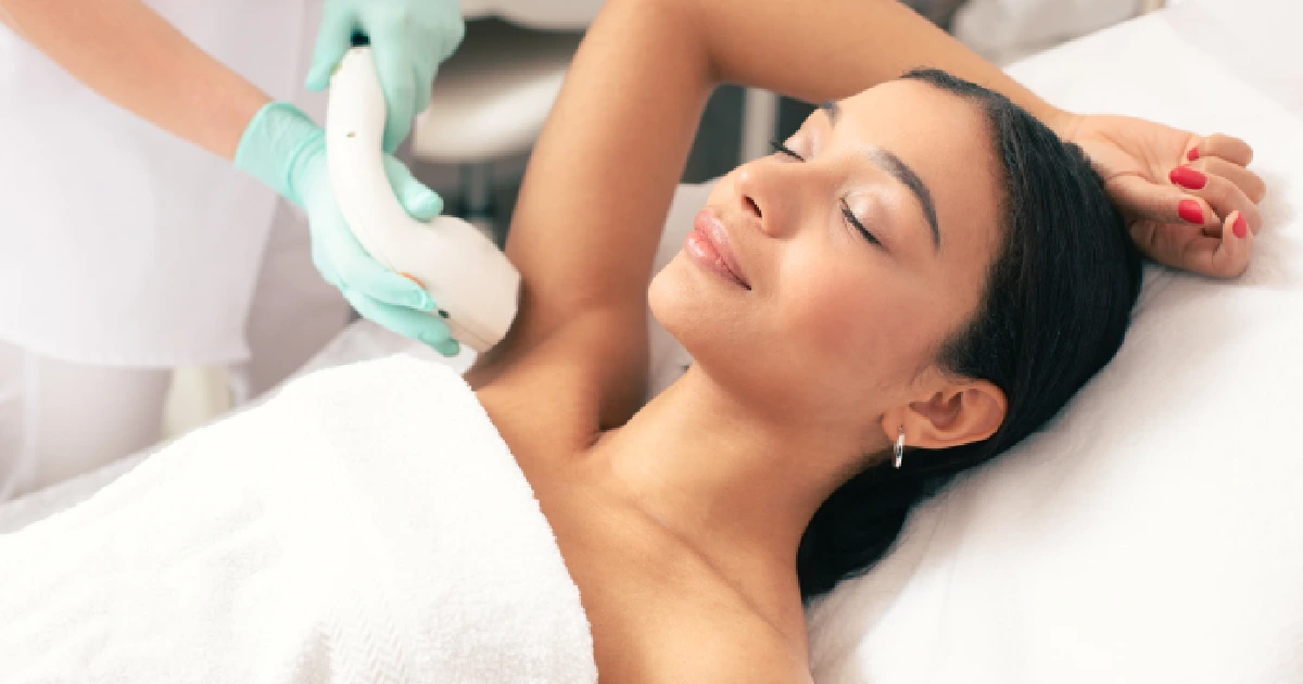 Young lady receiving Laser Hair Removal treatment in Lisle, IL