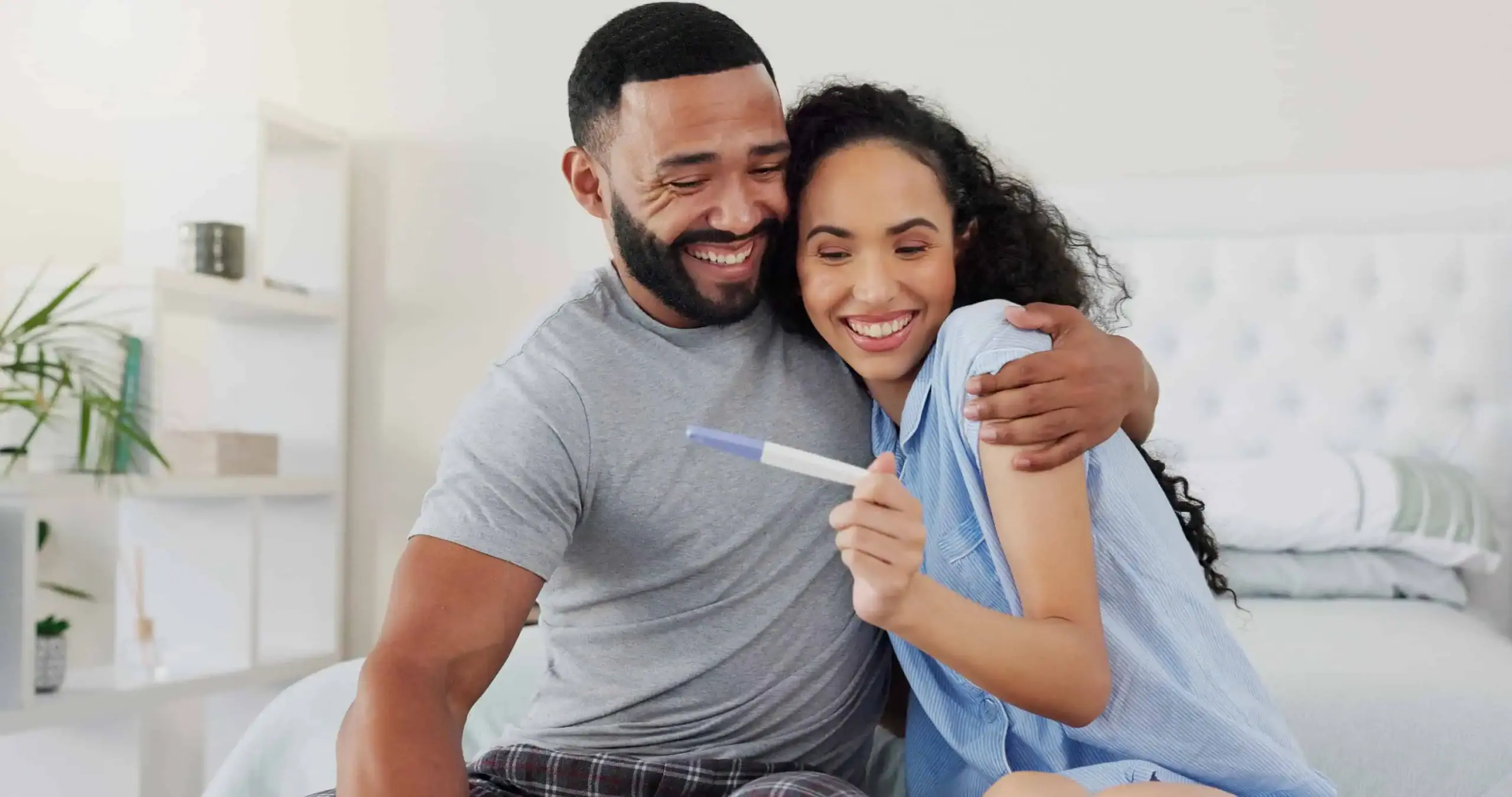 Happy couple post-treatment results from fertility and reproductive health services | Medical Spa in Lisle, IL | Advanced Care & Medspa